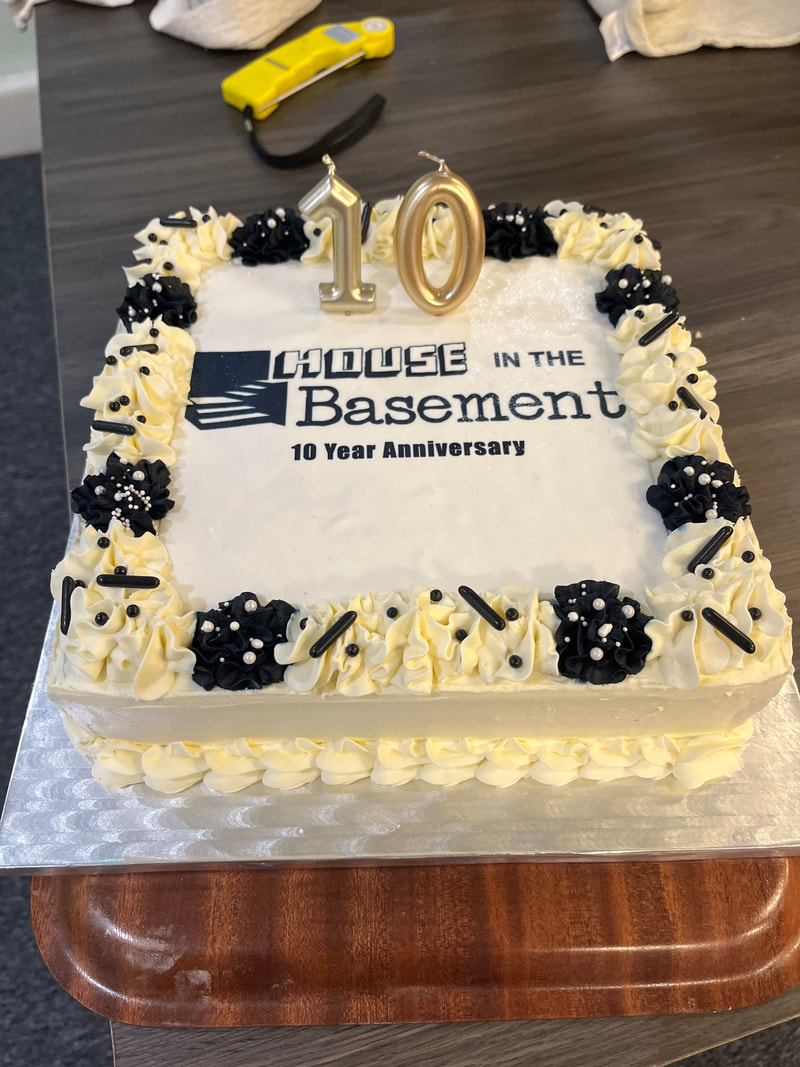 Image shows a cake created to Commemorate 10 years of House in the Basement